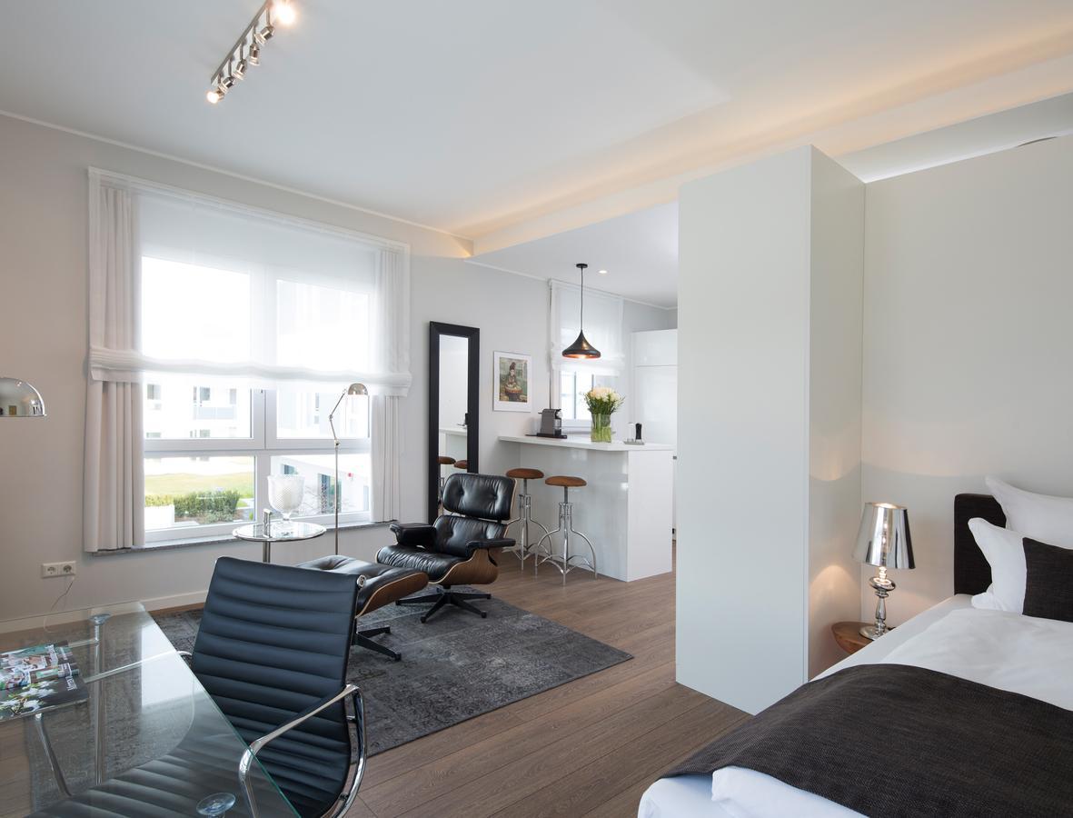 Logis First Class Business Suites Renningen Ruang foto