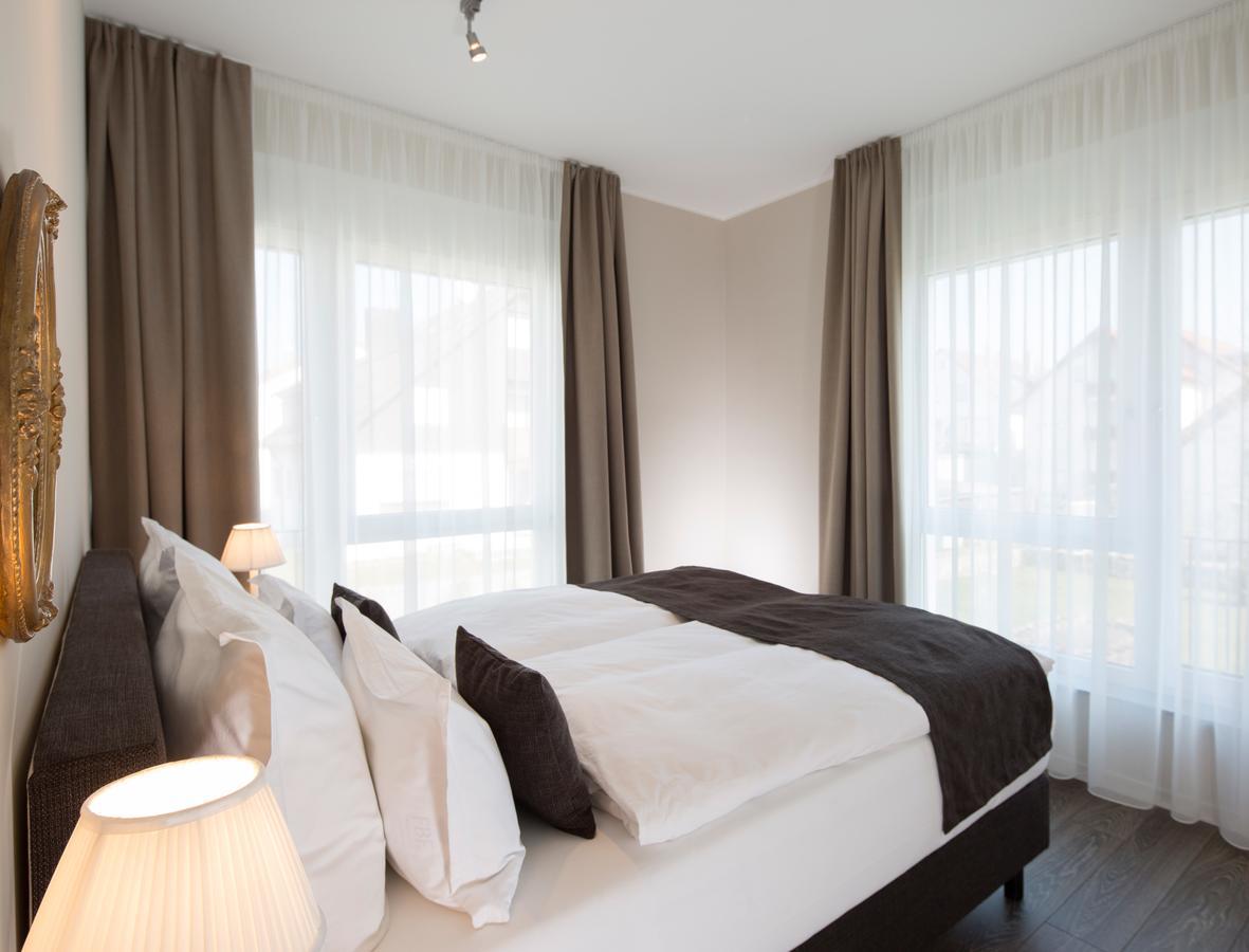 Logis First Class Business Suites Renningen Bagian luar foto